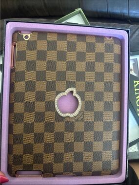 First an Apple iPad 2 (Model A1395) Luxury Checkered Brown Tablet Case.